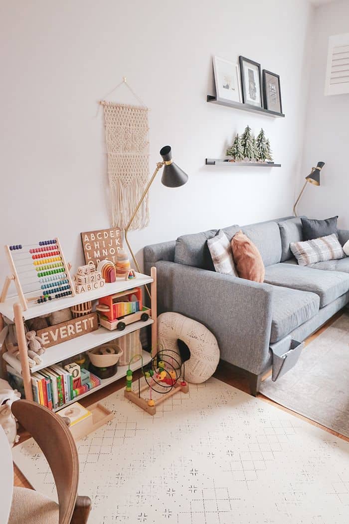 kid friendly living room - versatile shelving units 