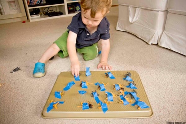 Fine motor activities for 1-year-olds -  Animal Tape Rescue Activity 