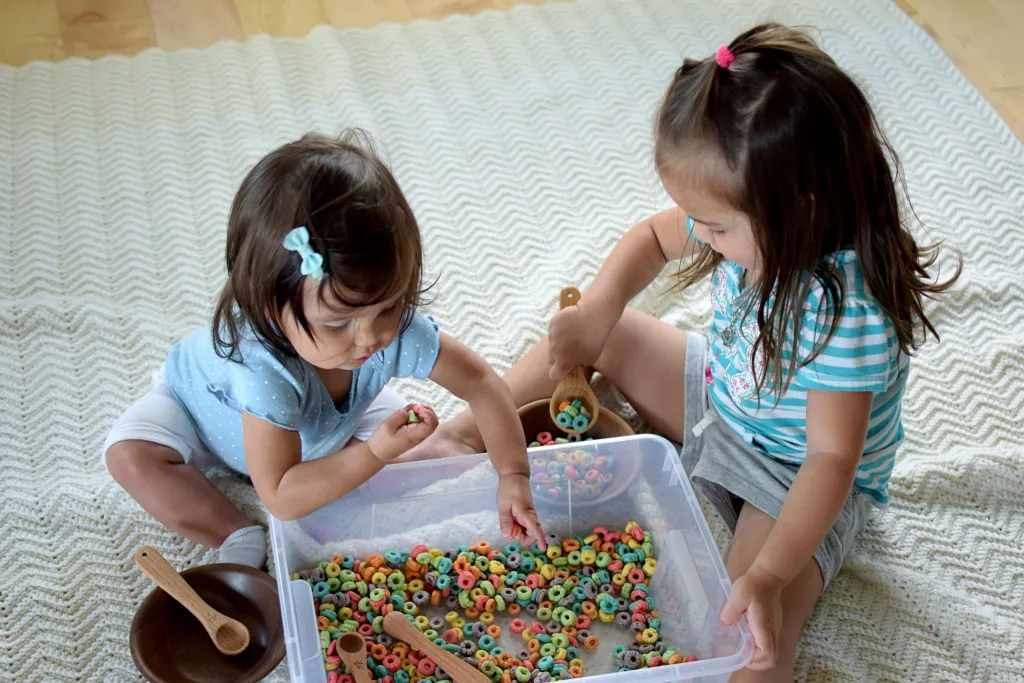 DIY sensory bin for 1-year-olds - Cereal Sensory Bin 