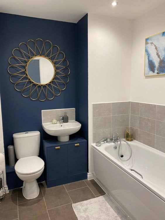 Navy blue bathroom accent wall idea