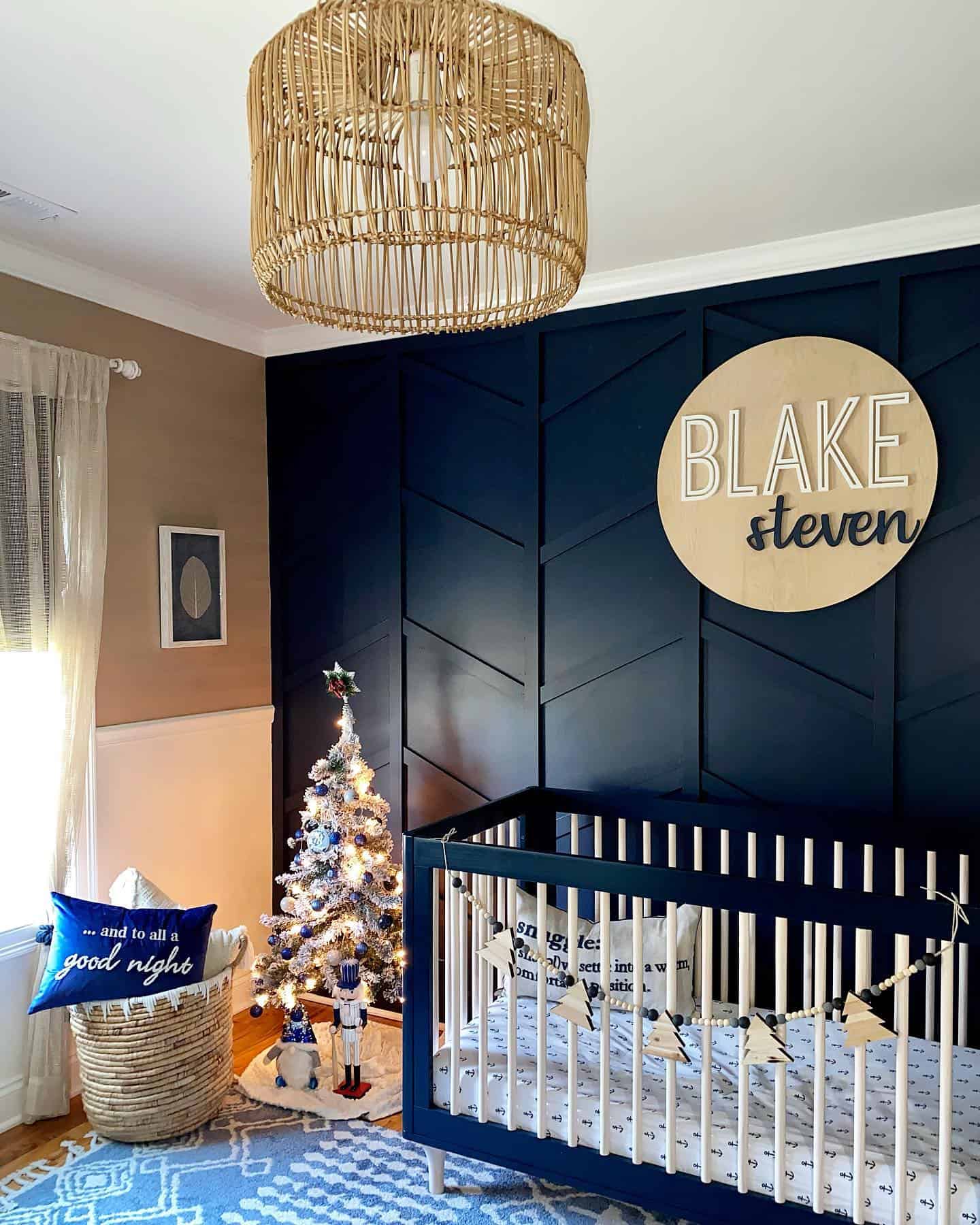 navy blue accent wall nursery